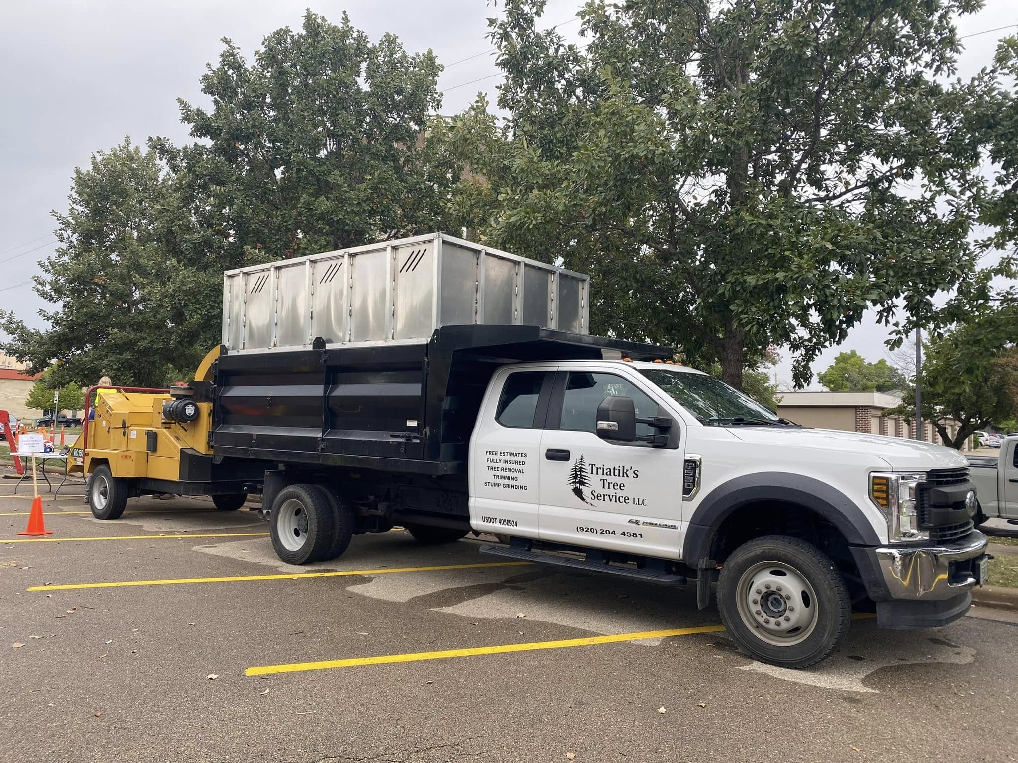 Triatik's Tree Service truck and chipper